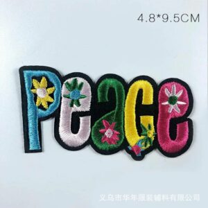 Écusson PEACE floral aux cinq couleurs de 9,5 cm