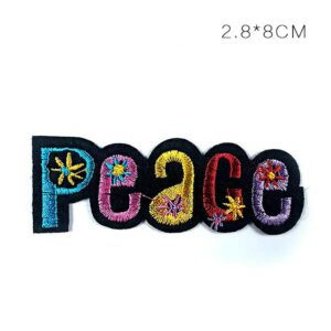 Petit écusson PEACE fleuri de 8 × 2,8 cm