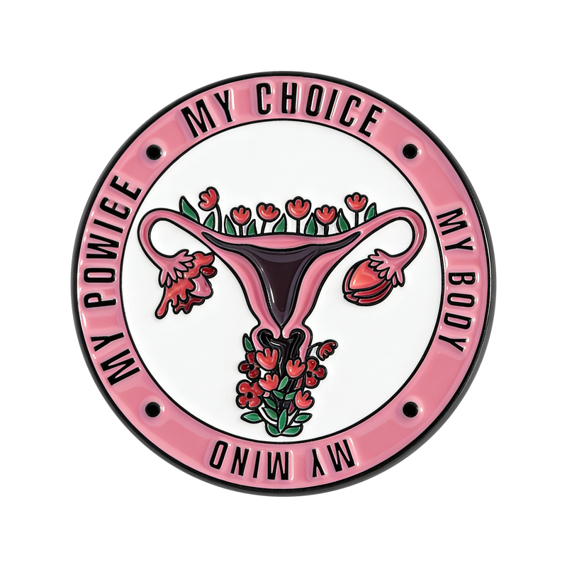 Pin rond rose à utérus et tulipes vu de face