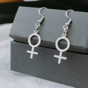 Boucles d’oreilles Vénus argentées dans un écrin